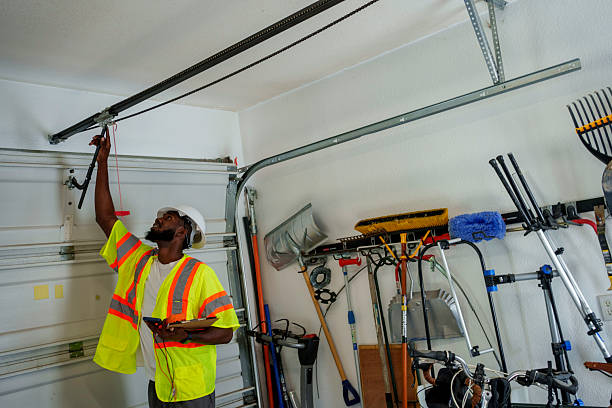 Professional Garage Door Installation technician working in Crooked Lake Park, FL